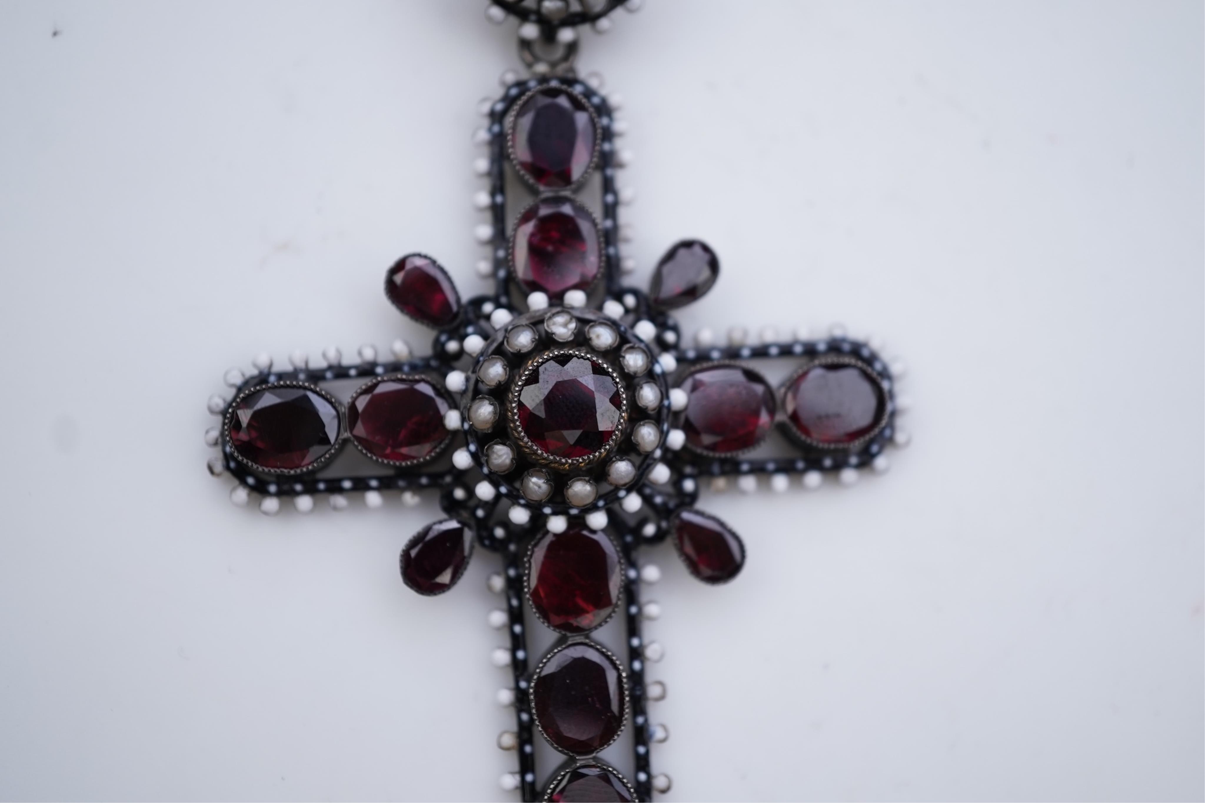 A Renaissance Revival enamel and garnet pendant, late 19th century